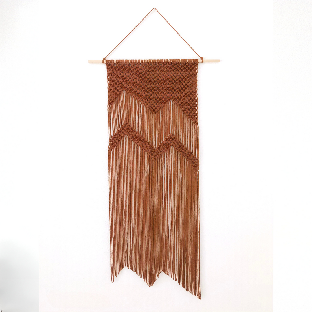 Macrame wall hanging featuring a mountain design, a bohemian decor piece handcrafted for nature lovers - Yashi Designs
