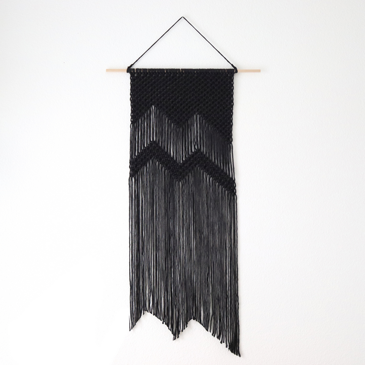 Macrame wall hanging featuring a mountain design, a bohemian decor piece handcrafted for nature lovers - Yashi Designs