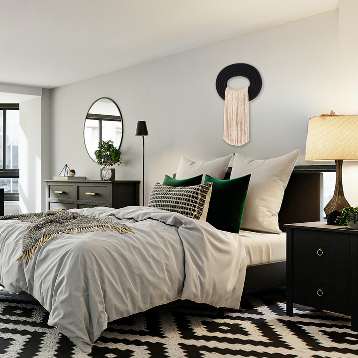 Elegant beige wall hanging tassel with a distinctive black circular accent for a modern decorative touch with Contemporary Wall hangings