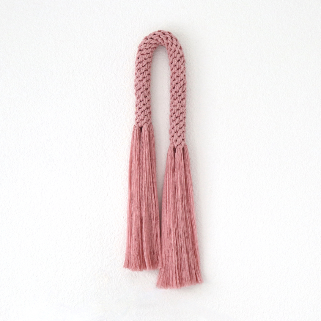 Knotted Macrame Wall Hanging, Handwoven wall hanging in dusty pink, showcasing an elegant knotted macrame style - Yashi Designs