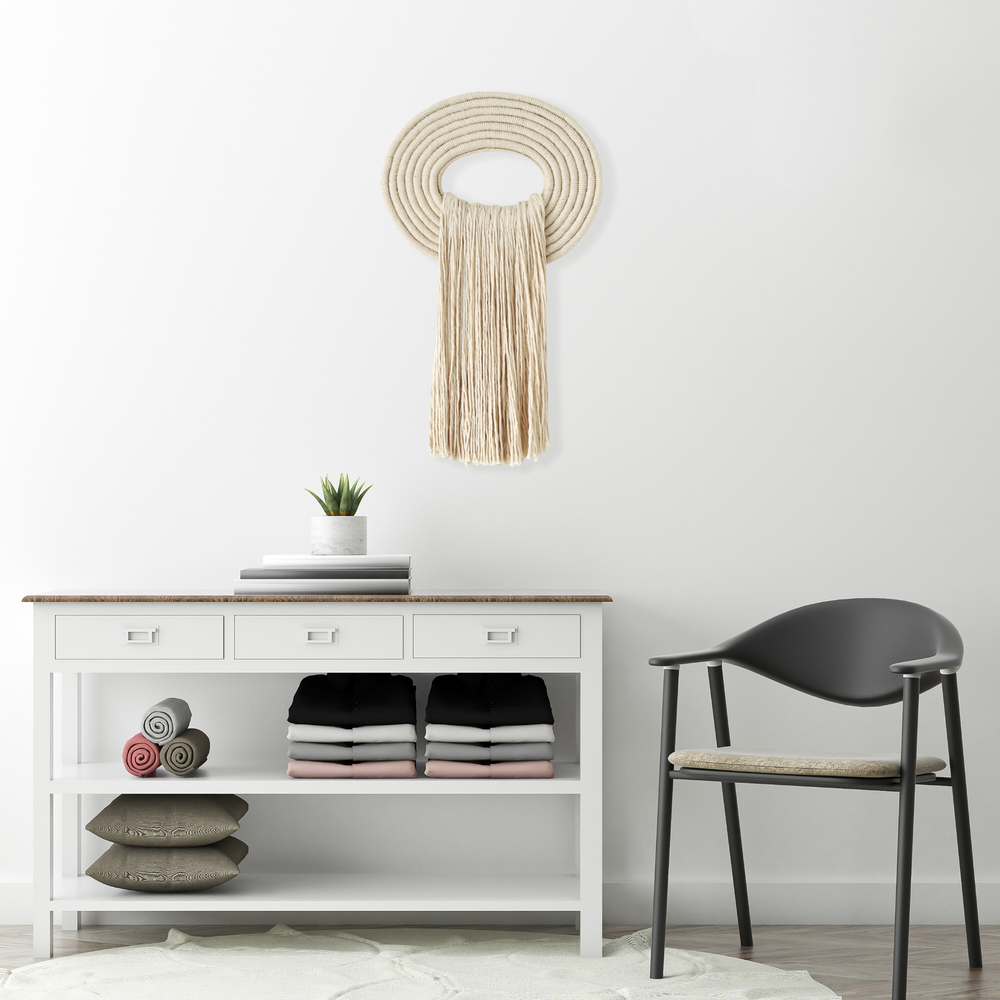 Elegant beige wall hanging tassel with a distinctive white circular accent for a modern decorative touch with Contemporary Wall hangings