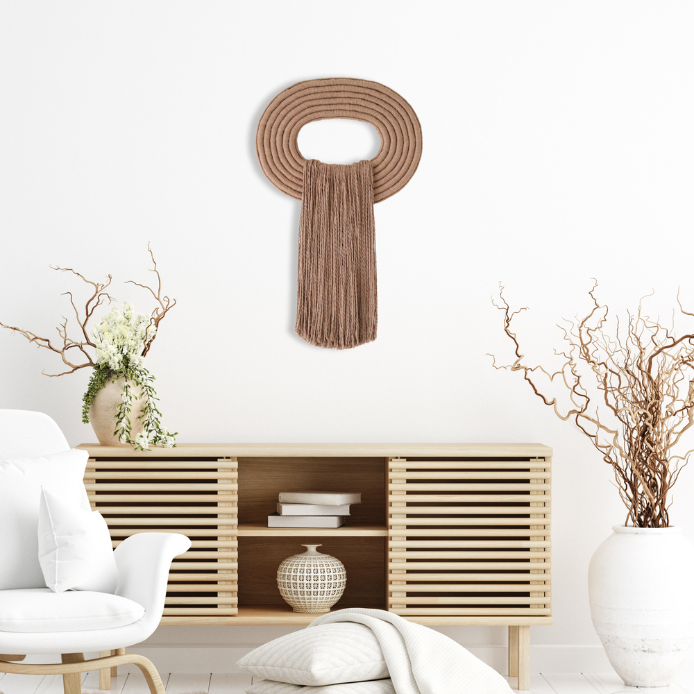 Elegant wall hanging tassel with a attractive brown circular accent for a modern decorative touch with Contemporary Wall hangings