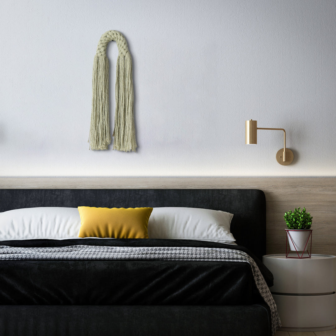 Small hemp tassel in sage green, a handcrafted Natural Dimensional Wall Art by Yashi Designs, minimalistic and modern wall hanging.