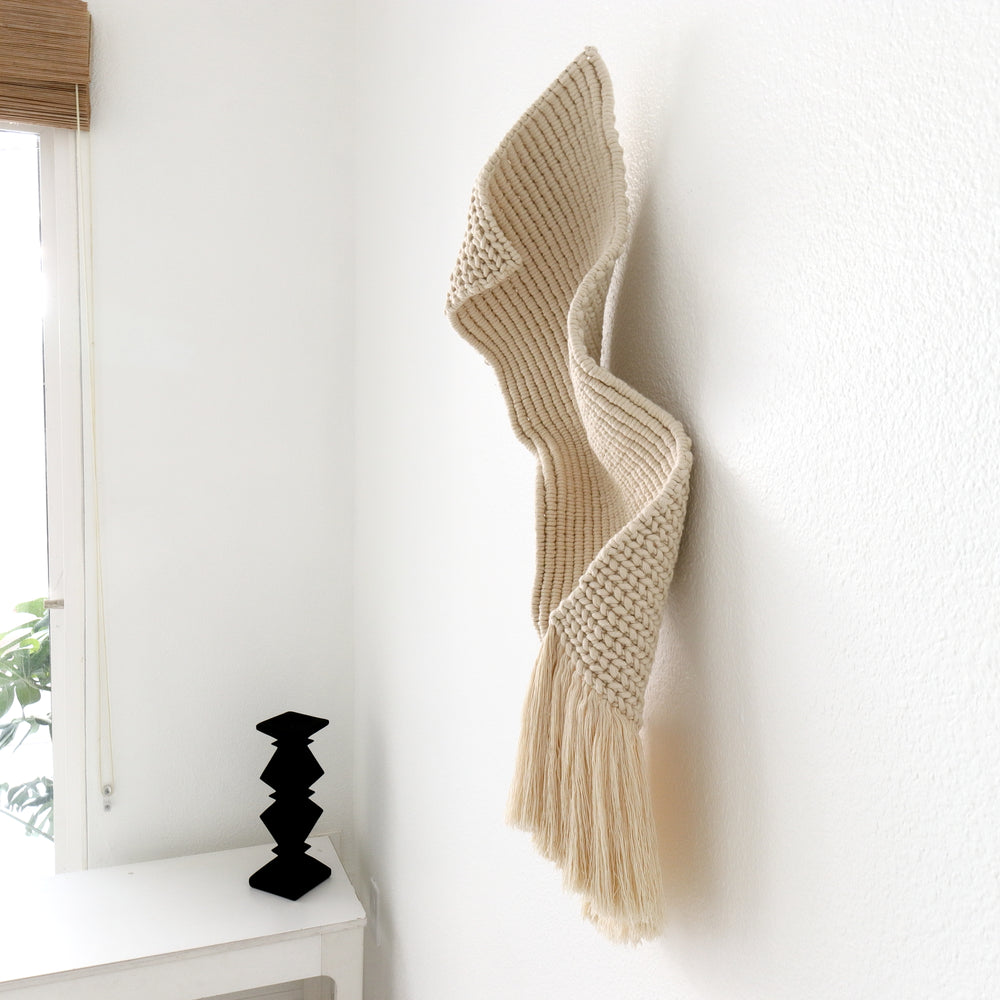 Side view of Ethereal, emphasizing its sculptural form and elegant movement.