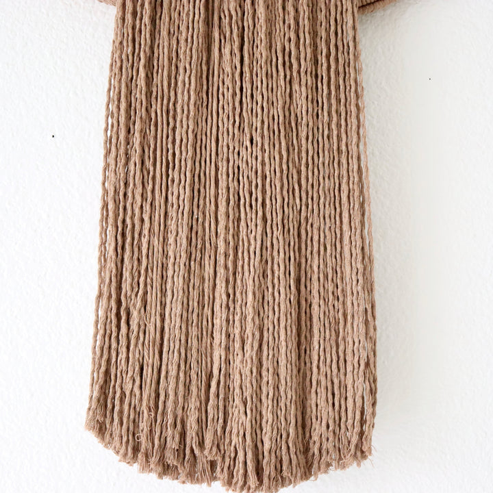 Elegant wall hanging tassel with a attractive brown circular accent for a modern decorative touch with Contemporary Wall hangings