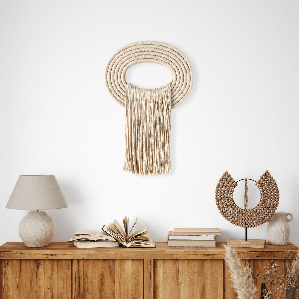 Elegant beige wall hanging tassel with a distinctive beige circular accent for a modern decorative touch with Contemporary Wall hangings