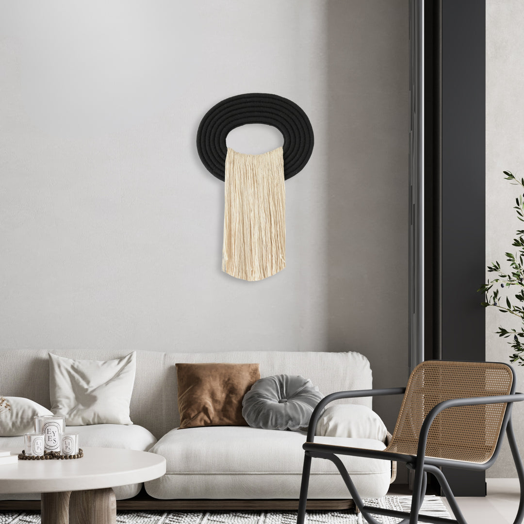 Waterfall inspired Hand-knotted fiber art made with natural material displayed in modern interiors, showcasing intricate craftsmanship and organic design.
