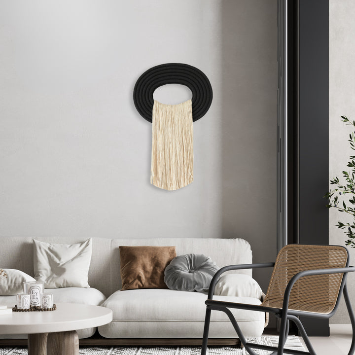 Waterfall inspired Hand-knotted fiber art made with natural material displayed in modern interiors, showcasing intricate craftsmanship and organic design.