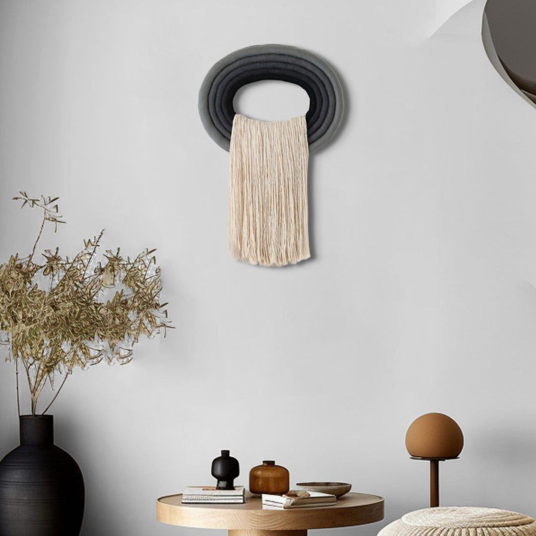 Elegant white wall hanging tassel with a distinctive grey & black circular accent for a modern decorative touch with Contemporary Wall hangings