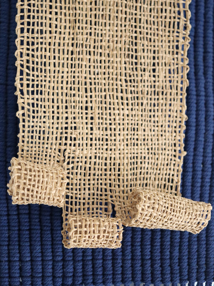 Navy blue and beige textured wall hanging with jute accents, handcrafted by Yashi Designs, perfect for adding depth and artisanal charm to any interior