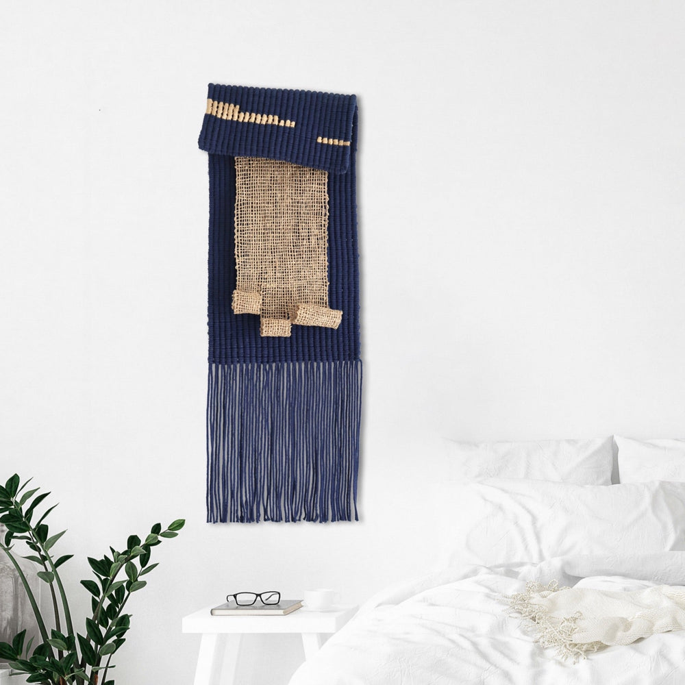 Navy blue and beige textured wall hanging with jute accents, handcrafted by Yashi Designs, perfect for adding depth and artisanal charm to any interior