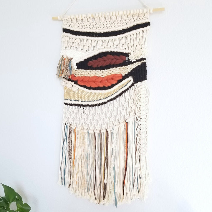Handcrafted macrame wall hanging featuring layered textures and colorful accents in a unique design, Find knotted fiber art, unique contemporary art