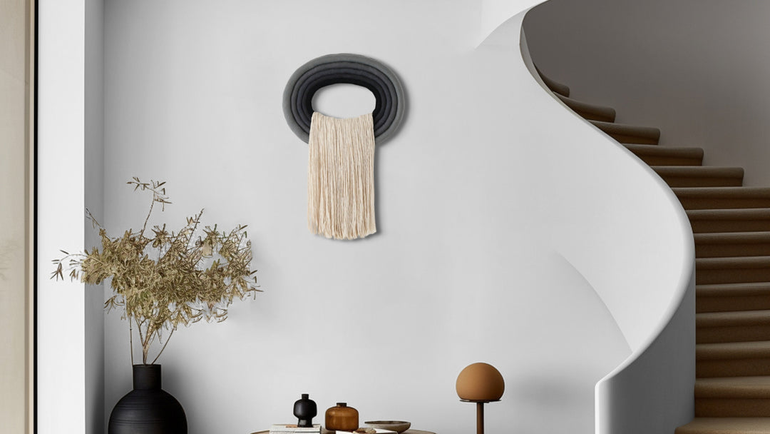Organic Modern - Japandi Style Wall Hanging, Rope Sculptures, Best Gift Under $1000 Elegant beige wall hanging tassel with a distinctive black circular accent for a modern decorative touch with Contemporary Wall hangings