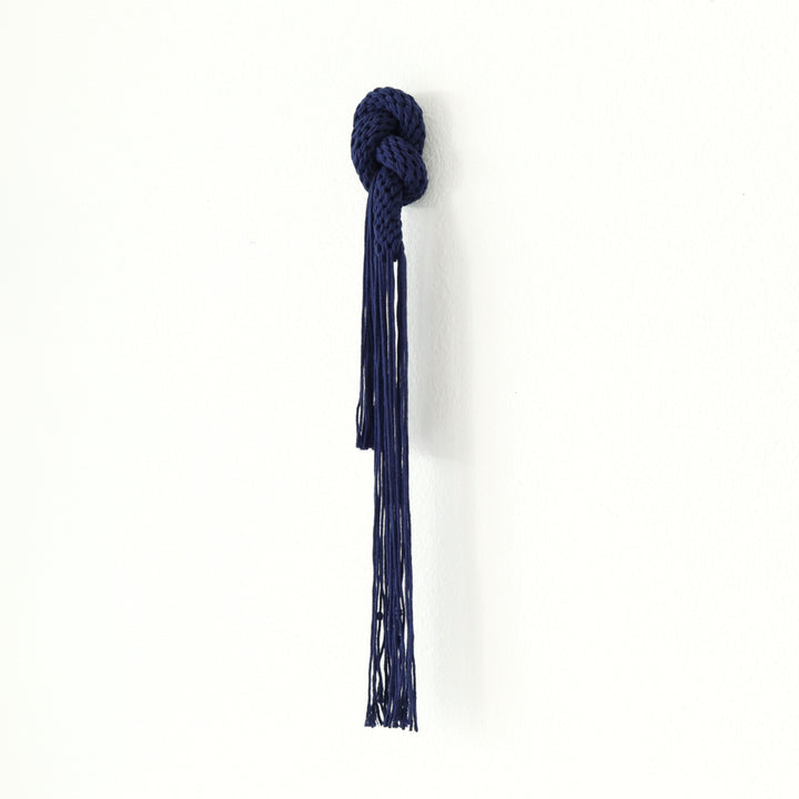 Knotted fiber art sculpture 'Connected' by Yashi Designs, perfect for modern minimalist home.