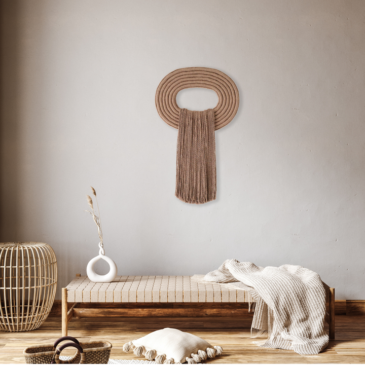Elegant wall hanging tassel with a attractive brown circular accent for a modern decorative touch with Contemporary Wall hangings