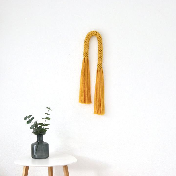 Knotted Macrame Wall Hanging, Handwoven wall hanging in sunshine yellow, showcasing an elegant knotted macrame style - Yashi Designs