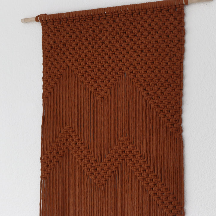Macrame mountains wall art – geometric knotting detail close-up