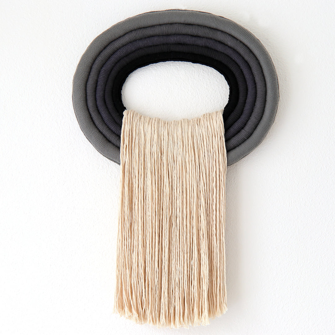 The Crest sculptural fiber wall art inspired by ocean waves
