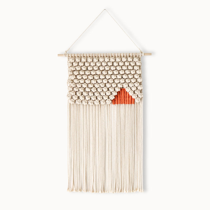 Macrame wall hanging depicting a landscape scene in warm hues, a perfect blend of art and craft - Yashi Designs