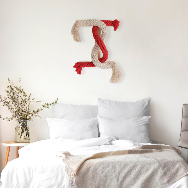 Into You – Handwoven Cotton Wall Sculpture in a Japandi-Style Bedroom Above White Pillows