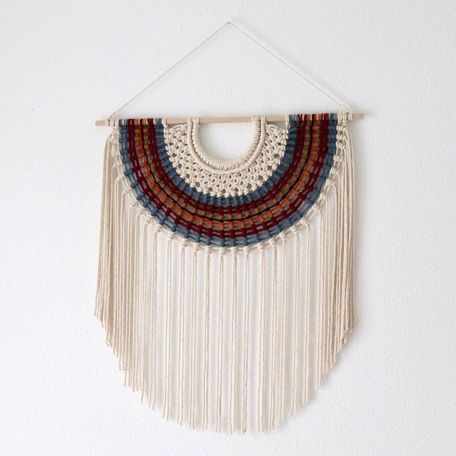 Contemporary macrame wall hanging 'TERRA' by Yashi Designs, showcasing handcrafted fiber art.