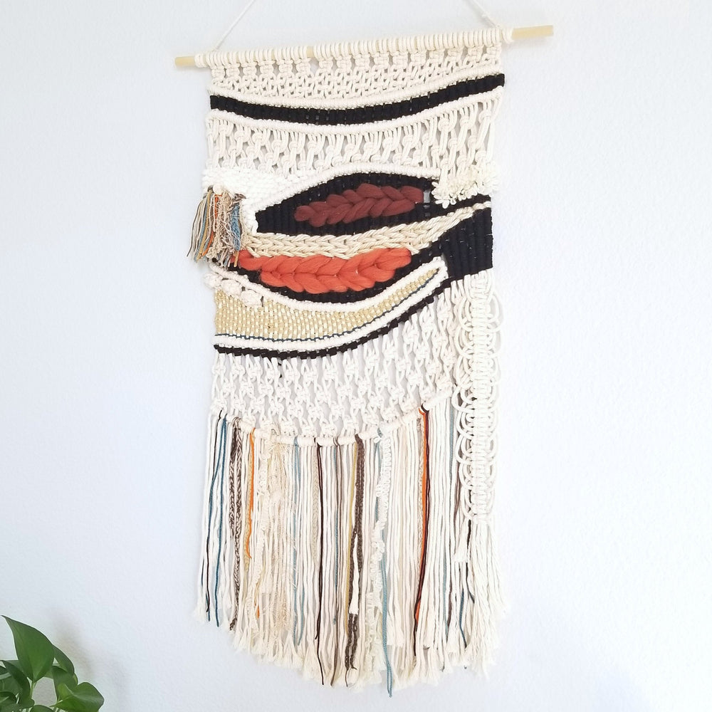 Handcrafted macrame wall hanging featuring layered textures and colorful accents in a unique design, Find knotted fiber art, unique contemporary art