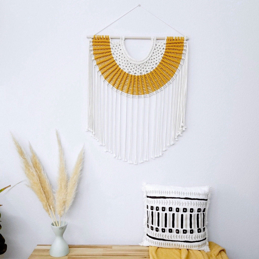Large Contemporary Fiber Art 'The Desert Sun' by Yashi Designs, features a radiant golden hue reminiscent of a desert landscape at sunset, crafted by Yashi designs, macrame art, minimalist fiber art, Contemporary art